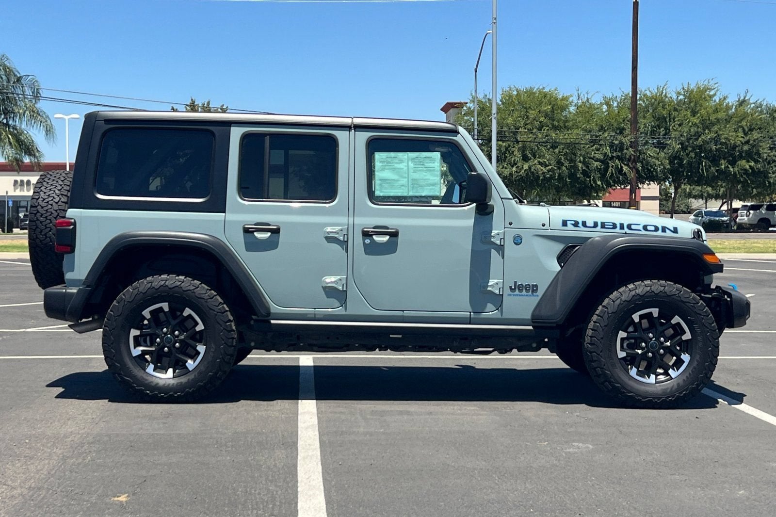 2024 Jeep Wrangler 4xe — rear three-quarter view