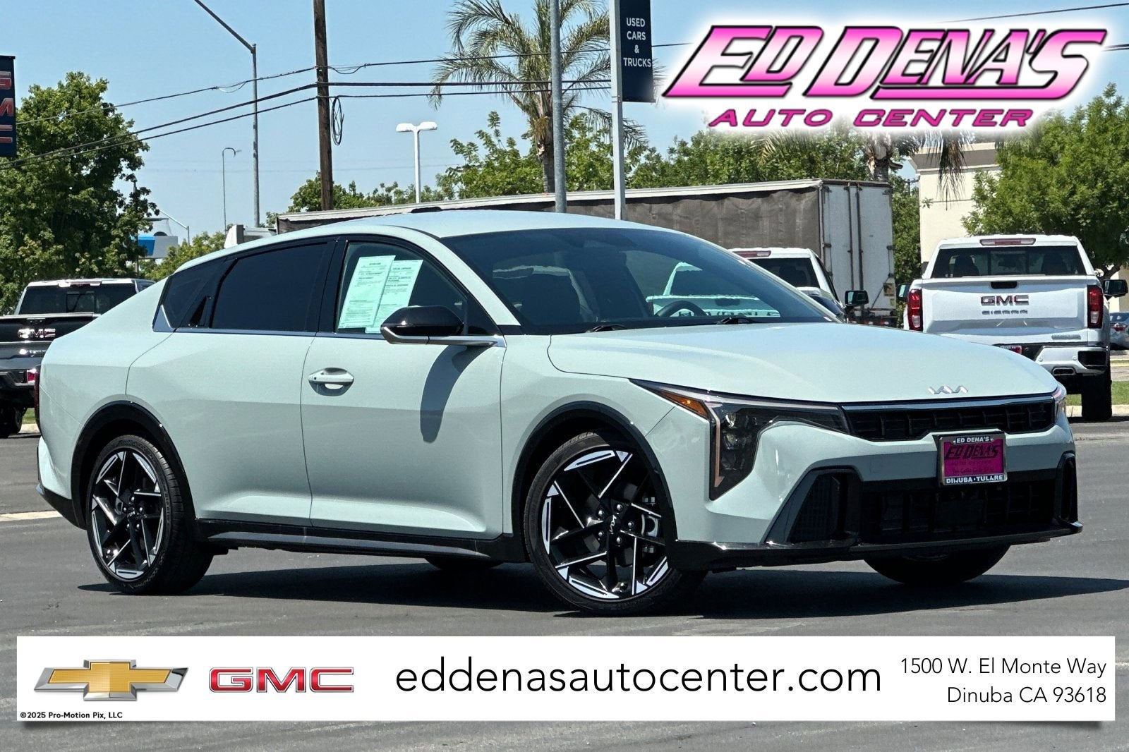 2025 Kia K4 GT-Line in Blue — front three-quarter view
