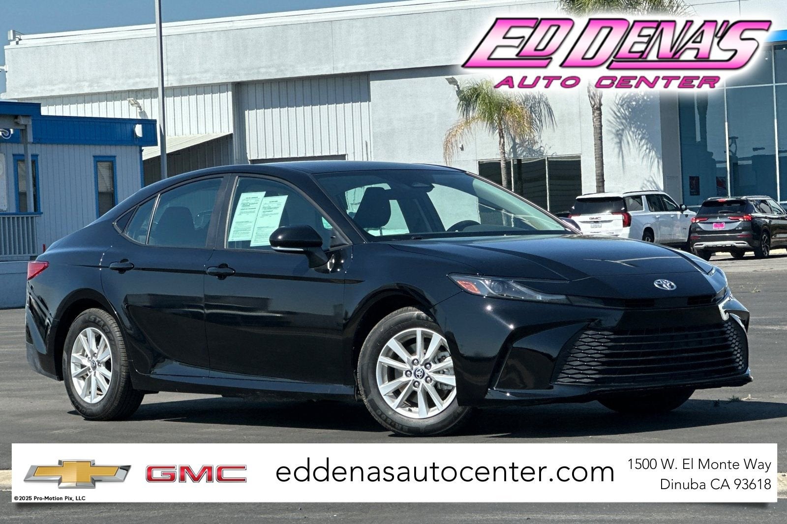 2025 Toyota Camry LE in Black — front three-quarter view
