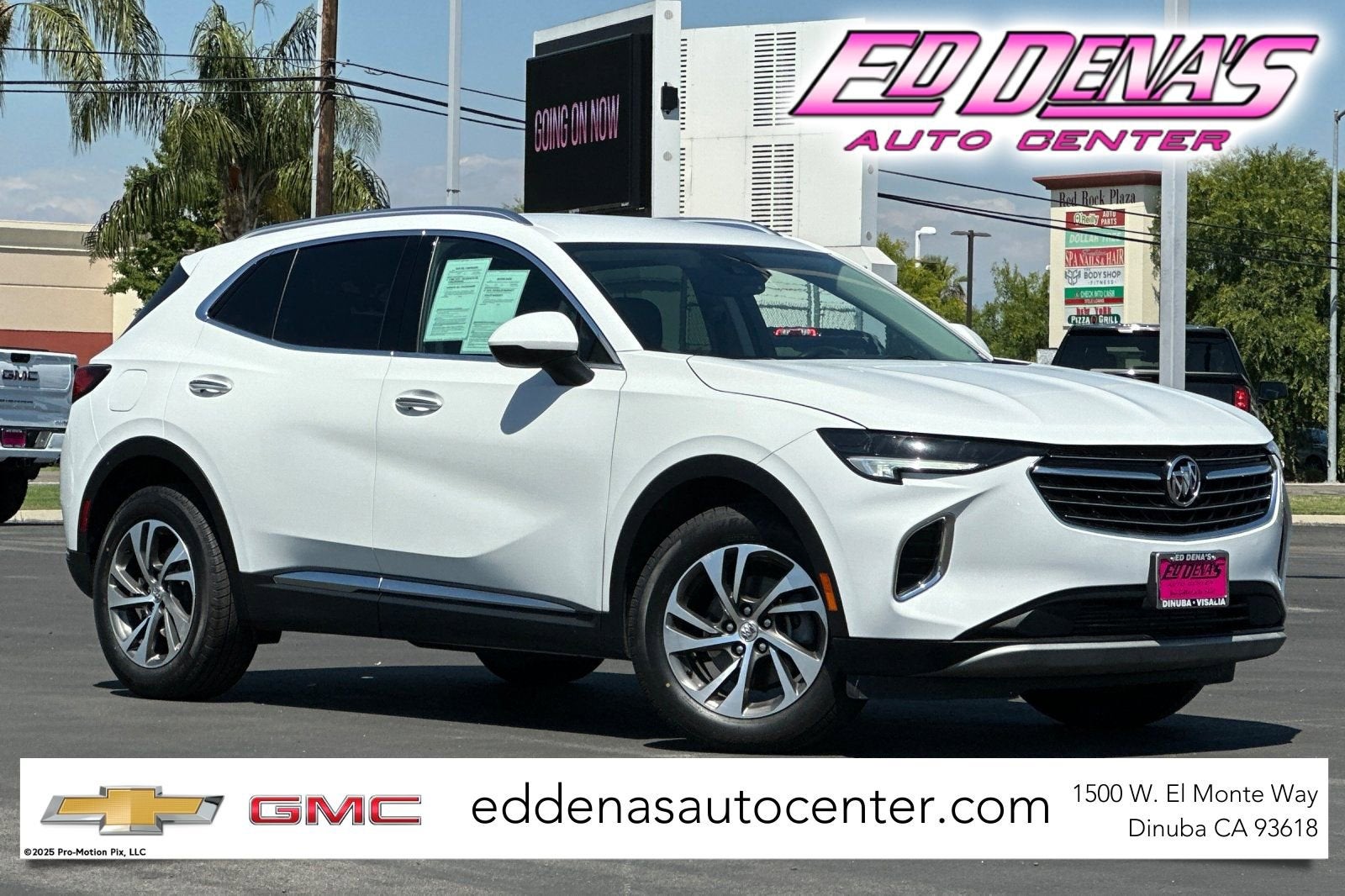 2023 Buick Envision Essence in Summit White — front three-quarter view